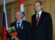 The governor of the Novosibirsk region Vasily Yurchenko handed over to Victor Kuznetsov a medal of honor